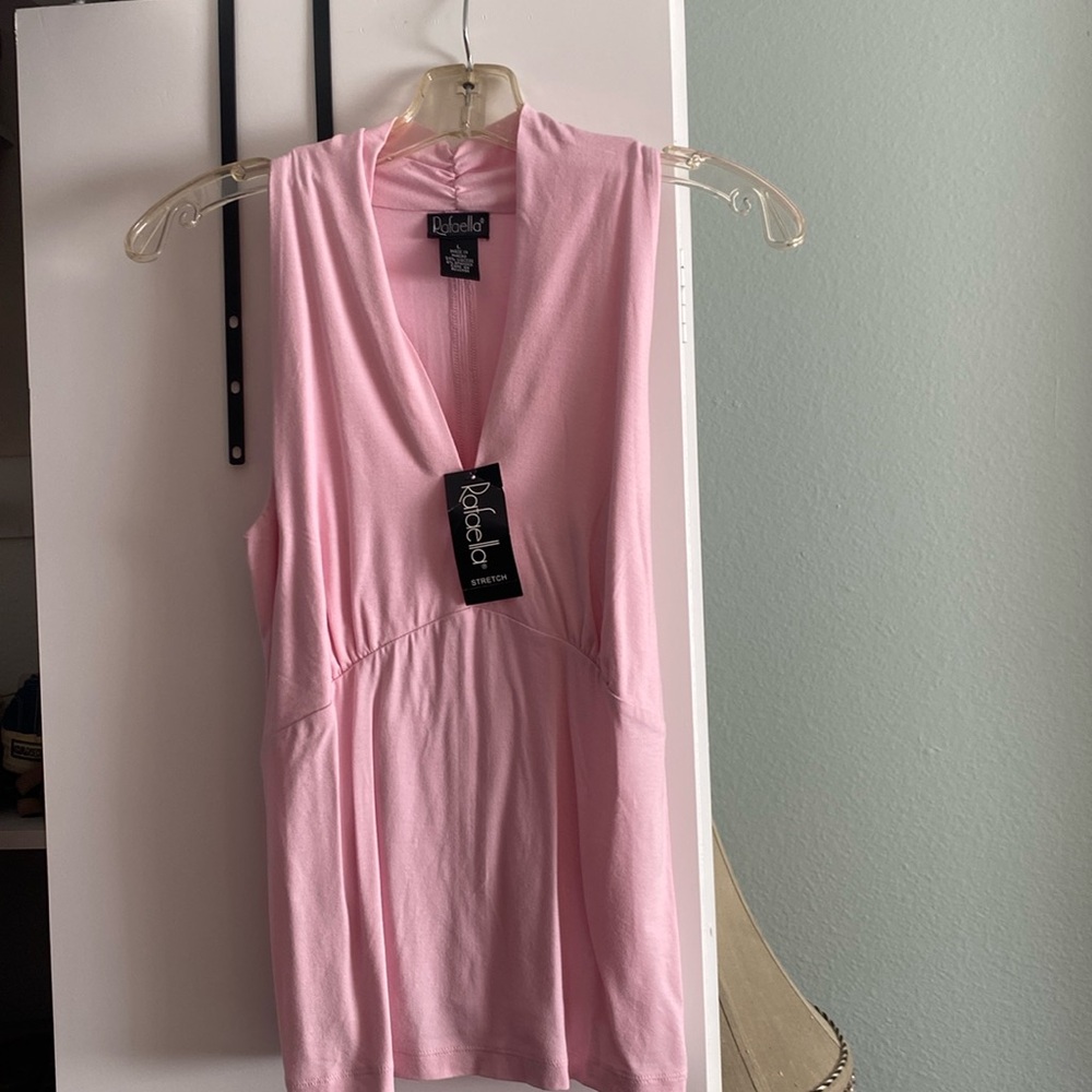 Sleeveless petal pink stretch blouse size L. Never worn with tags